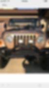 1J4FY19S5XP416179-1999-jeep-wrangler-2