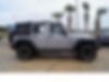 1C4BJWDG9EL156978-2014-jeep-wrangler-unlimited-2