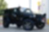 1J4GA39198L621492-2008-jeep-wrangler-2