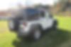 1J4BA3H16AL228308-2010-jeep-wrangler-unlimited-2