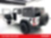 1C4BJWDG9HL662640-2017-jeep-wrangler-unlimited-2