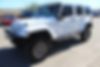 1C4BJWEG0DL660915-2013-jeep-wrangler-unlimited-2