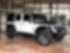 1C4HJWDG7EL243725-2014-jeep-wrangler-unlimited-sport-0