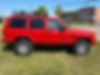 1J4FF48S01L556972-2001-jeep-sport-2