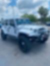 1C4BJWEGXCL184557-2012-jeep-wrangler-unlimited-sahara-2