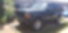 1J4FF68S4XL520156-1999-jeep-cherokee-0
