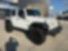 1C4BJWDG4JL860418-2018-jeep-wrangler-jk-unlimited-0