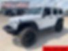 1C4BJWEG7FL655116-2015-jeep-sahara-0