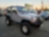 1J4FA49S0YP769016-2000-jeep-wrangler-0