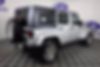 1J4GB59159L755281-2009-jeep-wrangler-unlimited-2