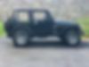 1J4FY19S5XP419115-1999-jeep-wrangler-2