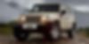 1J4HA3H16BL547672-2011-jeep-wrangler-unlimited-0